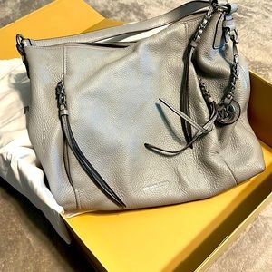 Light, gray shoulder, tote purse from MICHAEL KORS.
